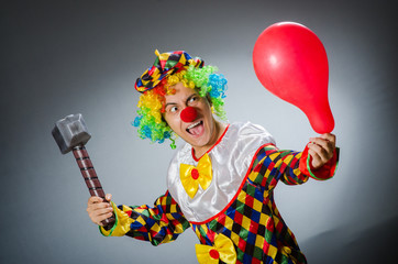 Funny clown in comical concept