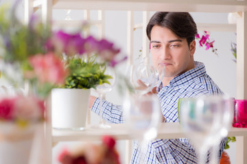Young handsome man shopping in shop