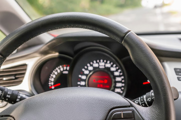 Obraz na płótnie Canvas Car interior with steering wheel and dashboard