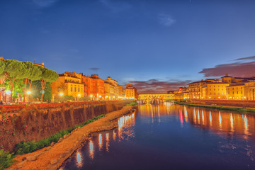 Fototapeta na wymiar Beautiful landscape, panorama on historical view of the Florence - Ponte Vecchio is a bridge in Florence at night time. Italy.