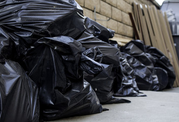 Construction trash bags and scraps.