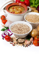 brown rice and quinoa and fresh ingredients on a white background, vertical