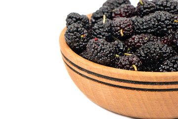 Black mulberries in bowl
