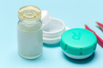 Contact lens, contact lens case, tweezers