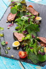 vegetable salad with grilled meat