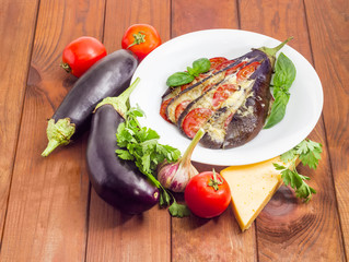 Baked stuffed eggplant and ingredients for its cooking