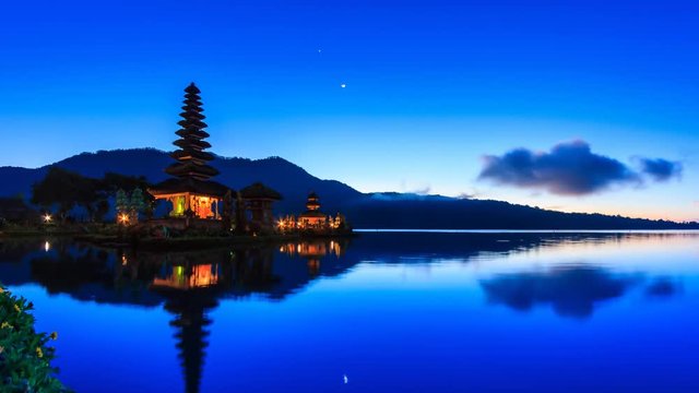 Pura Ulun Danu Bratan Temple On Water, Bali Landmark Travel Place Of Indonesia 4K Night to Day Time lapse (tilt down)