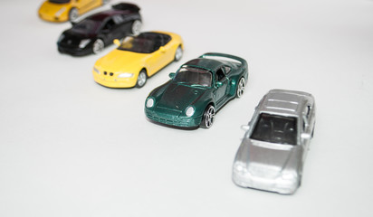 toy cars on white background, colorful cars