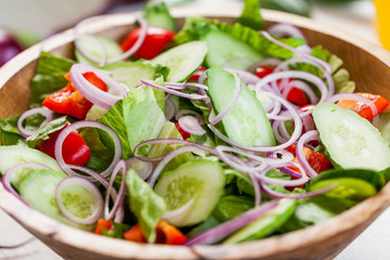 vegetable salad bowl on kitchen table, balanced diet