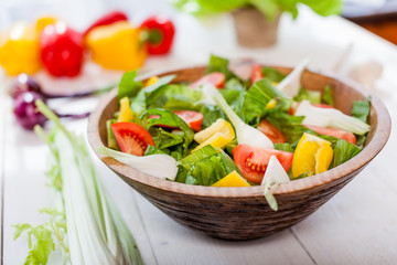 vegetable salad bowl on kitchen table, balanced diet