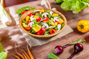 vegetable salad bowl on kitchen table, balanced diet