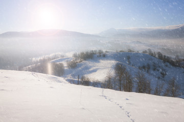 Fototapeta na wymiar Winter mountain snowy hills