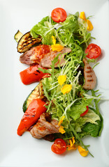 Salad with meat on plate