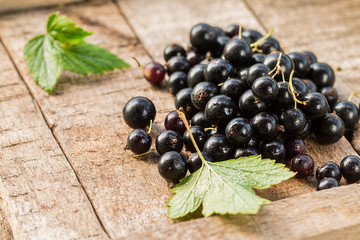 black currant on a wooden table
