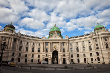 Fototapeta na wymiar Hofburg Palace in capital city of Vienna in Austria, Michaelertrakt - St. Michael's Wing, former Habsburgs' Winter Imperial Residence