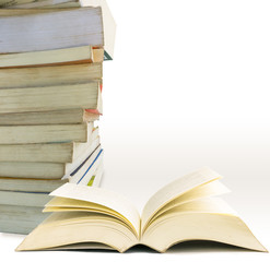 Old book stack lined up on a white background