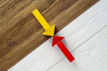 Two arrows pointing to each other.