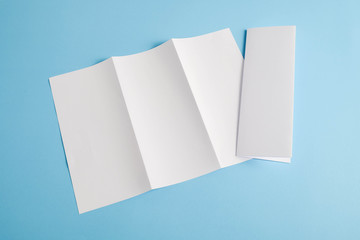 template fold white paper on blue background