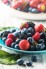 different berries in bowl.