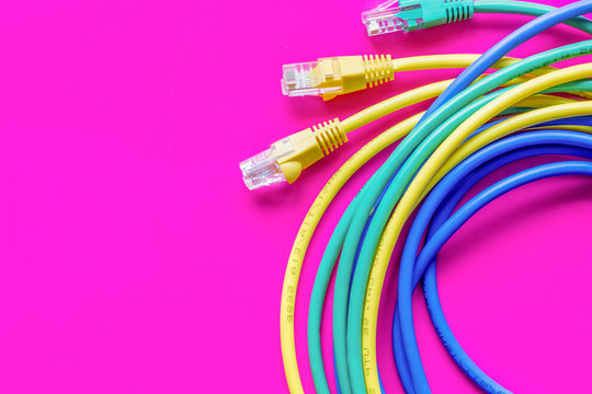 Concept Network Internet Cable On Pink Background Close Up