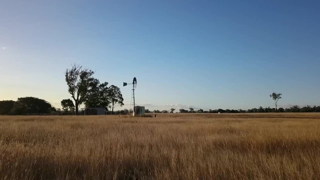 Windmill in the countryside of Queensland, Australia.