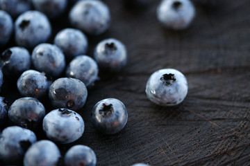 Blueberries on a dark wooden background