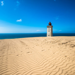 Abandoned Rubjerg Knude Lighthouse and sand dunes, North Sea coast, Denmark