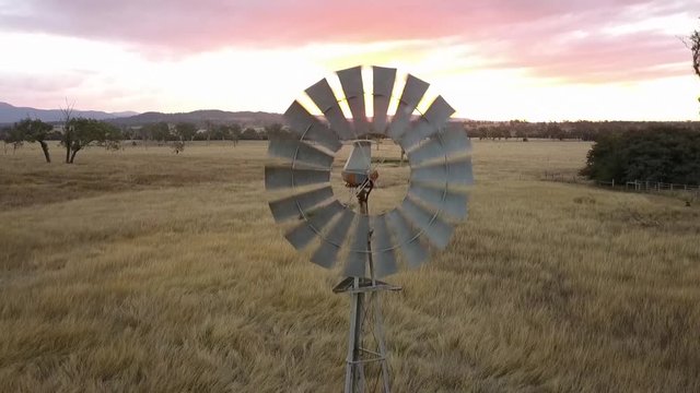 Windmill in the countryside of Queensland, Australia.