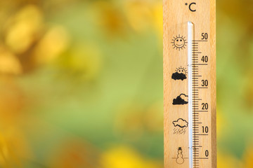 nice weather in the autumn shown with mercury thermometer