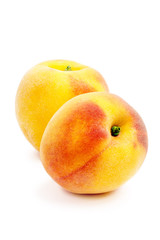 Two peach Isolated on a white background. Summer juicy fruit. Healthy food. Bright juicy colors.