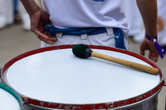 close-up drum and drum sticks, outdoors. Traditional musical instrument of Brazil