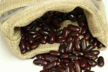 red bean or kidney bean scatter in brown sack