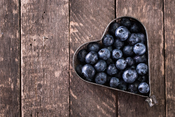 Blueberry antioxidant organic superfood in a bowl concept for healthy eating and nutrition