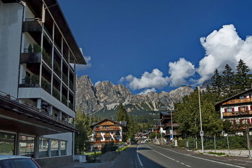 Autumnal corso Italia, the residential district in the town Cortina d'Ampezzo with mountain, Dolomite, Alps, Veneto, Italy, Europe