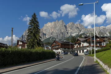 Autumnal corso Italia, the residential district in the town Cortina d'Ampezzo with mountain, Dolomite, Alps, Veneto, Italy, Europe