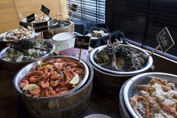 alaskan king crab oysters irish tiger prawn and lemon on ice