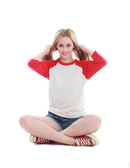full length portrait of a blonde girl wearing casual t-shirt and denim shorts. isolated on white...