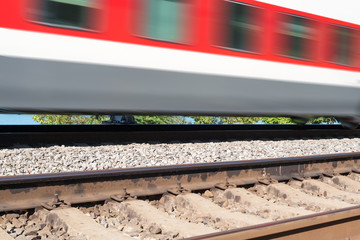 Fototapeta premium cars of the train moving on rails