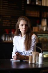 The girl in the cafe breakfast