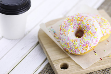 Donut on a wooden white background