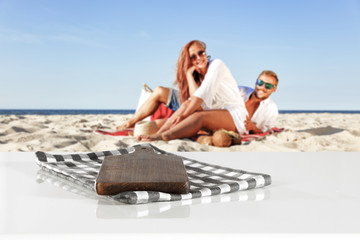 desk space and lovers on beach 