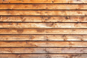 Old vintage cracked rustic burned brown wood texture. Background and surface for design ideas. Top view. Natural wooden board. Pine and oak wood table and wall. Country fence texture.