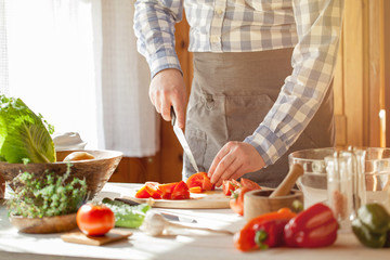 male cooking healthy salad