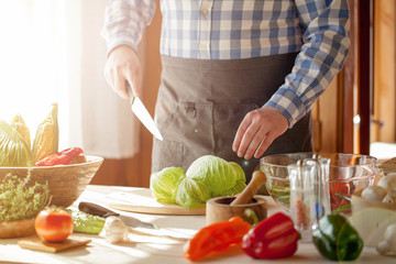 male cooking healthy salad