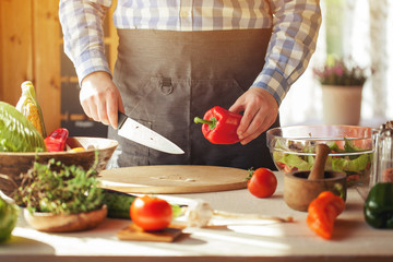 male cooking healthy salad