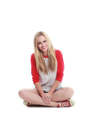 full length portrait of a blonde girl wearing casual t-shirt and denim shorts. isolated on white...