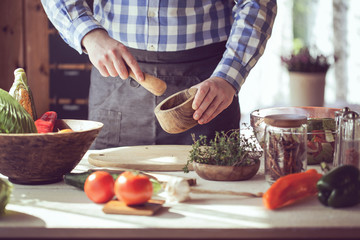 male cooking healthy salad