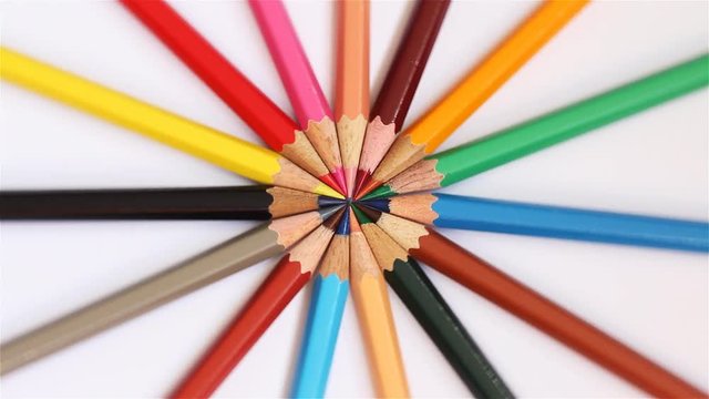 Rotating pencils on white background