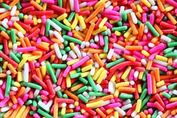 close up of colorful sprinkle sugar as background