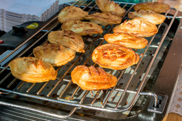 Traditional Polish smoked cheese made of sheep milk known as oscypek on barbecue. 